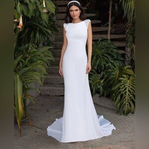 Pronovias Reed dress with sequin shoulders. Simple and elegant. Worn once.